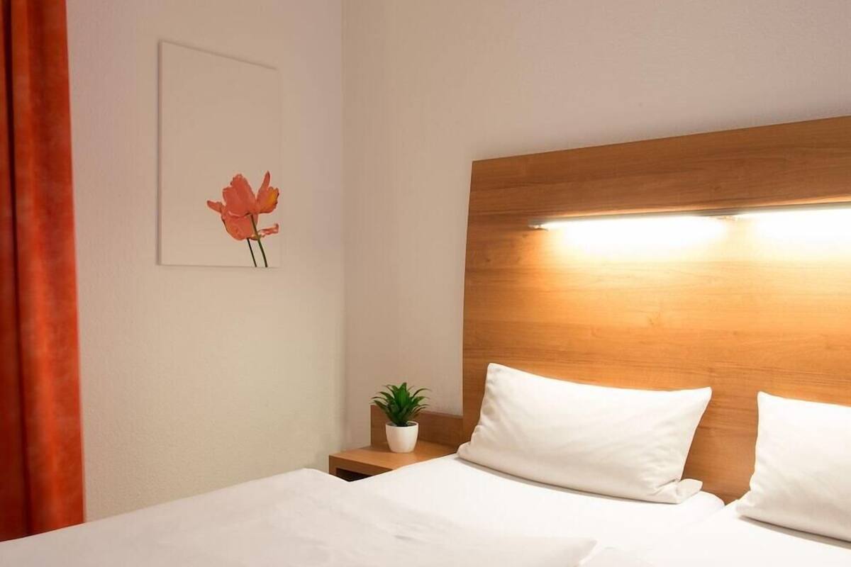 hypo-allergenic bedding, in-room safe, desk, blackout curtains