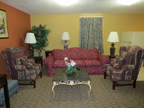 One King Bed, Non-Smoking | Living area - First Western Inn Caseyville (Caseyville)