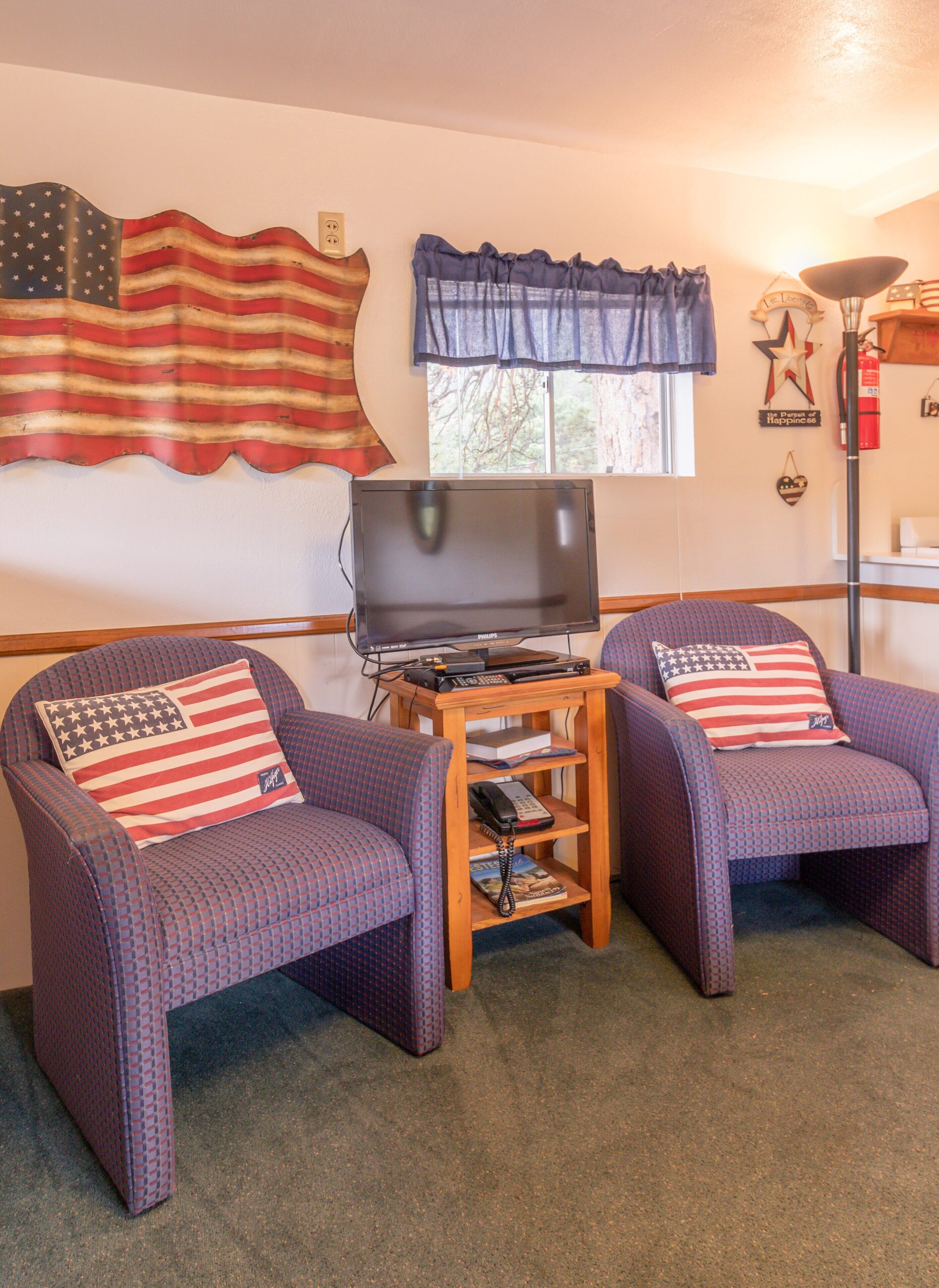 americana #3 - (cabin, 2 adults / 2 children) | living area | 34-inch flat-screen tv with cable channels, tv, dvd player