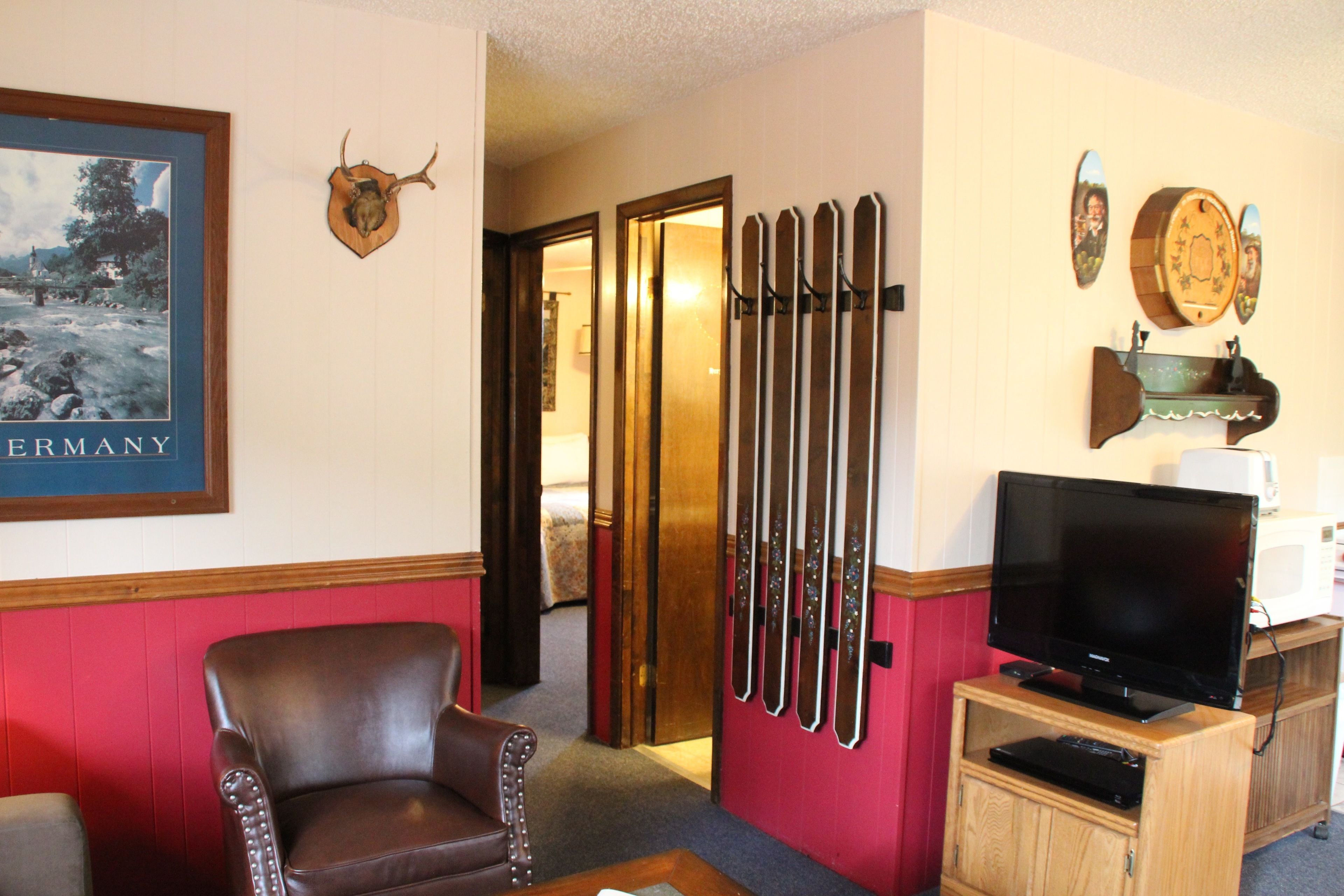 rock 'n river #26 (river cabin, private hot tub, fireplace, sleeps 6 adults and 2 children) | living area | 34-inch flat-screen tv with cable channels, tv, dvd player