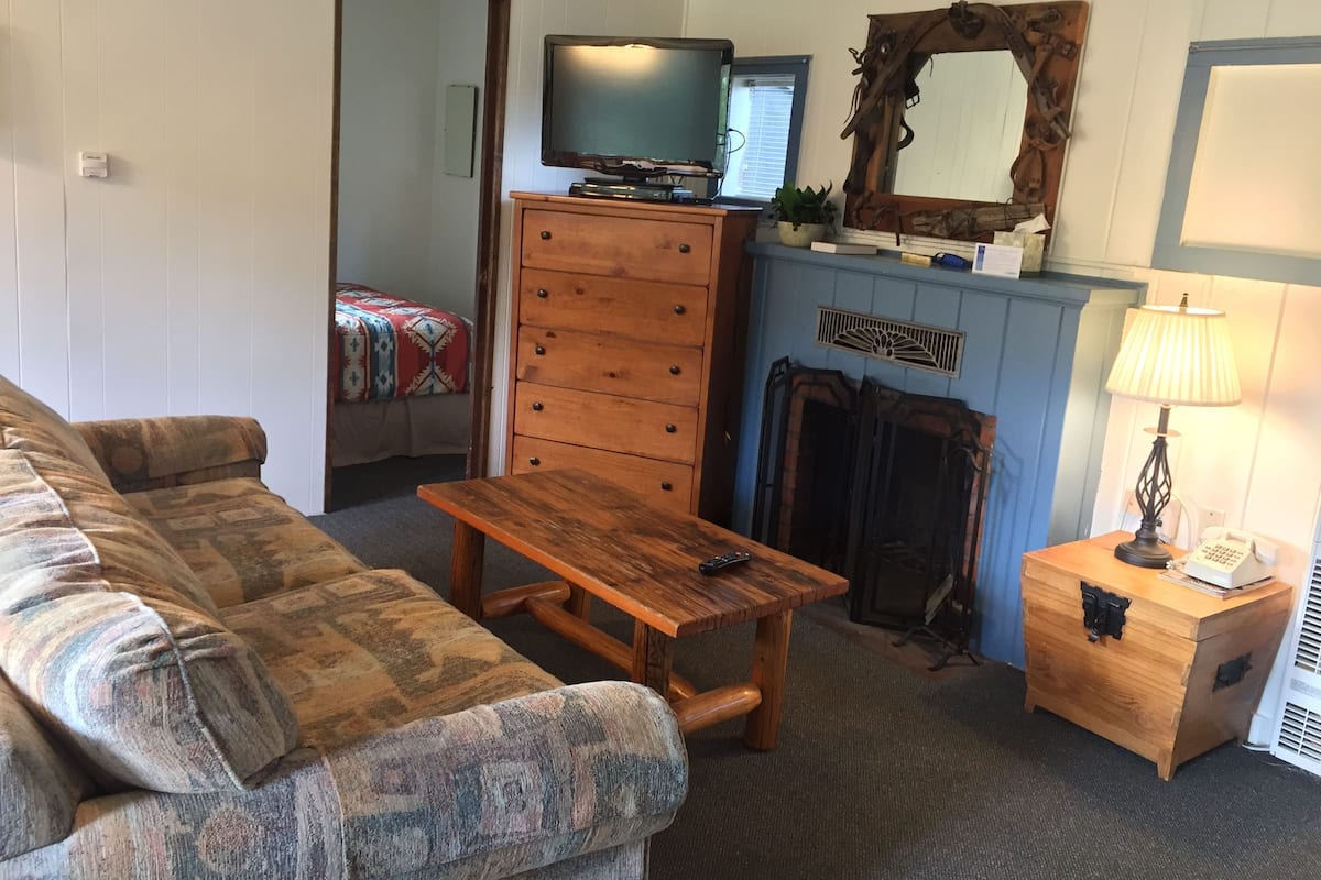 Bunkhouse #7 (River Cabin, Private Hot Tub, Fireplace, 6 adults, 2 children) | Living room | 34-inch flat-screen TV with cable channels, TV, DVD player