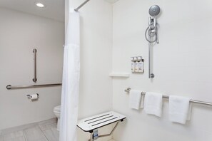 Combined shower/bathtub, designer toiletries, hair dryer, towels