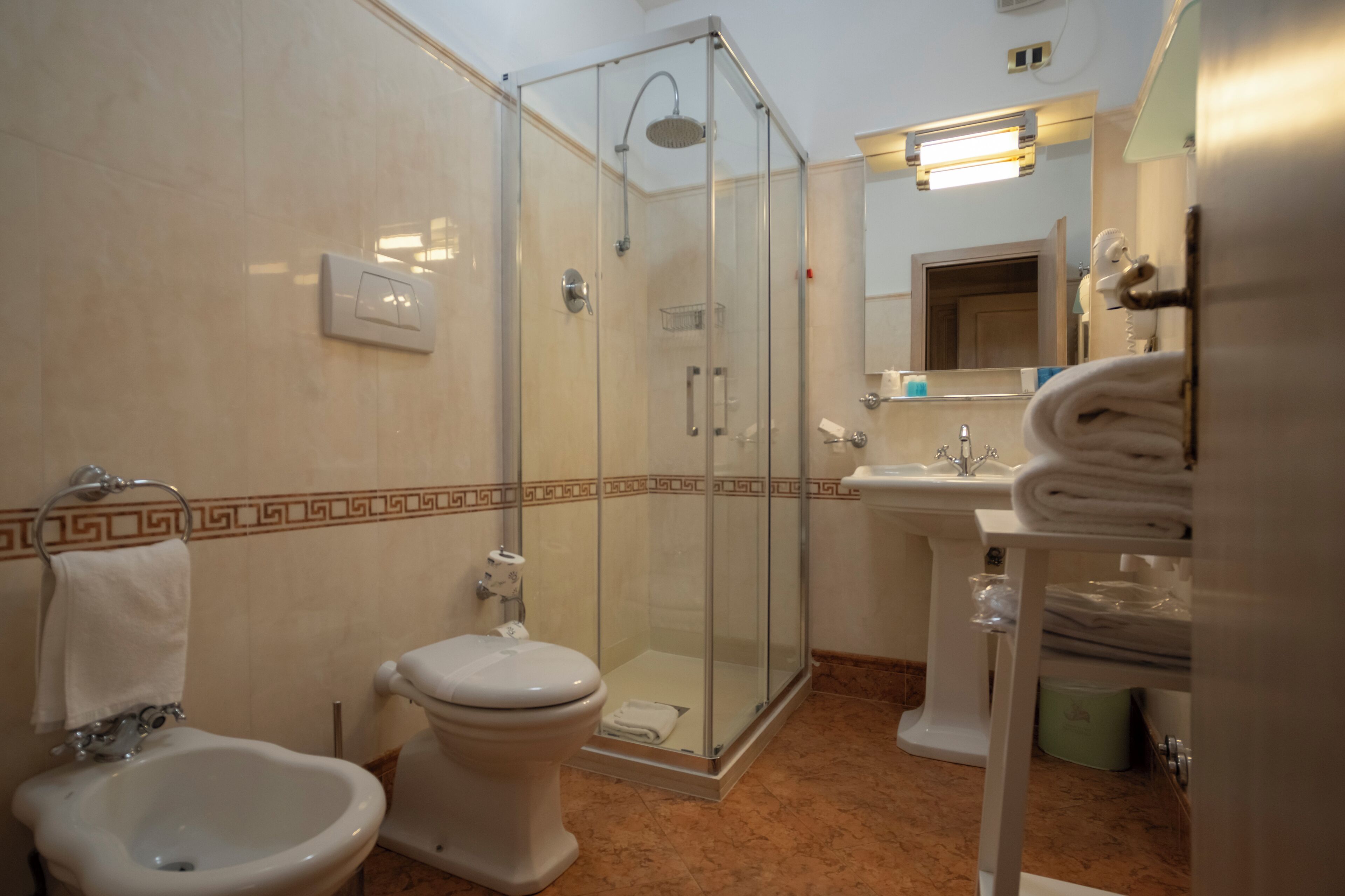 junior room | bathroom | shower, hair dryer, slippers, bidet