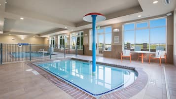 Indoor pool, open 8 AM to 10 PM, pool loungers