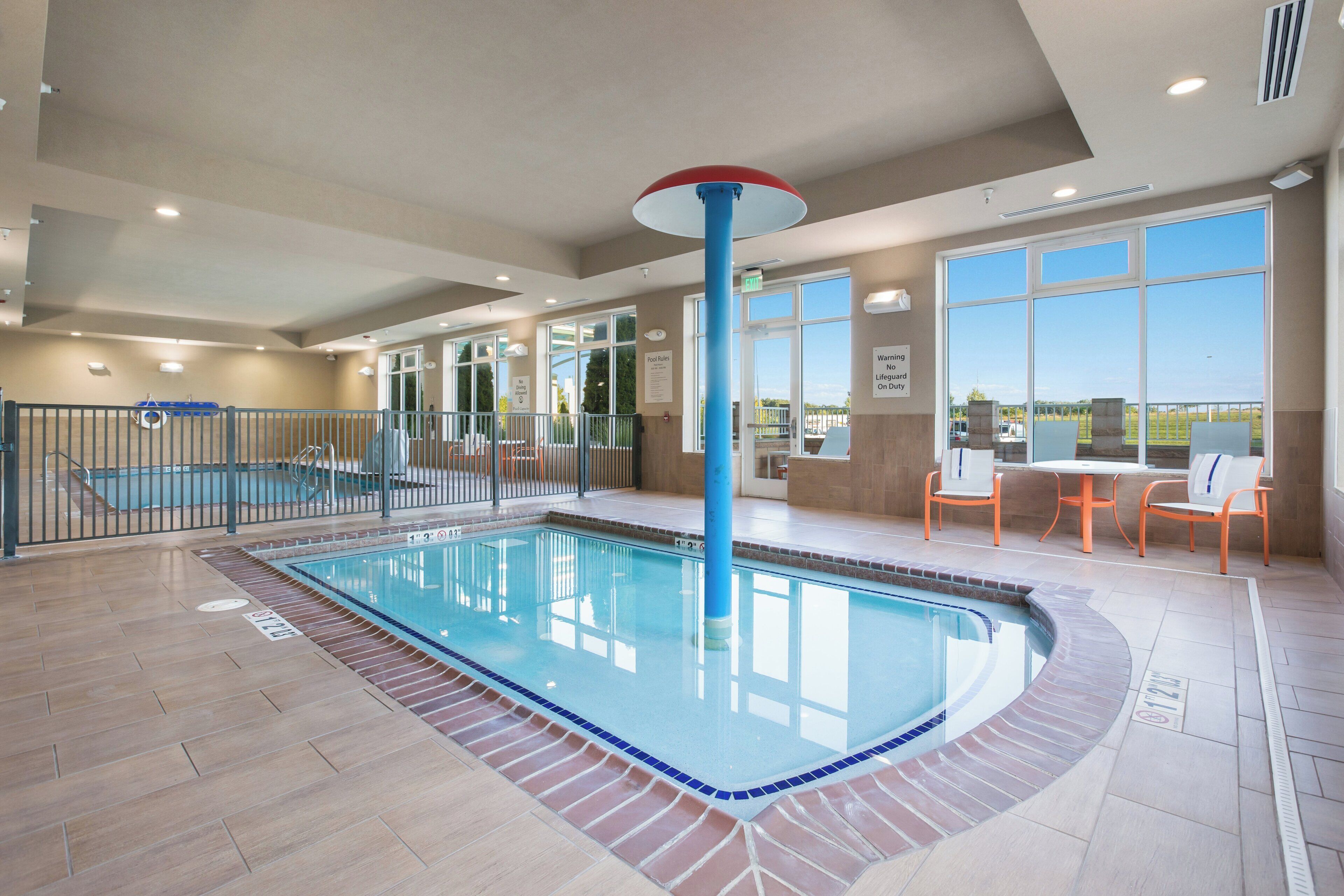 Indoor pool, open 8 AM to 10 PM, pool loungers