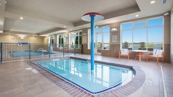 Indoor pool, open 8 AM to 10 PM, pool loungers