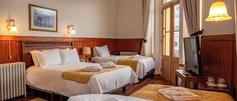 Habitacion cuadruple estandar | Brankas, Wi-Fi gratis, dan seprai linen