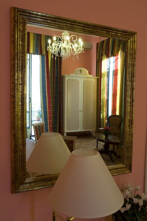 Superior Triple Room | Minibar, in-room safe, desk, blackout curtains