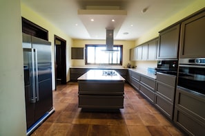 Family Penthouse | Private kitchen | Coffee/tea maker, eco-friendly cleaning products
