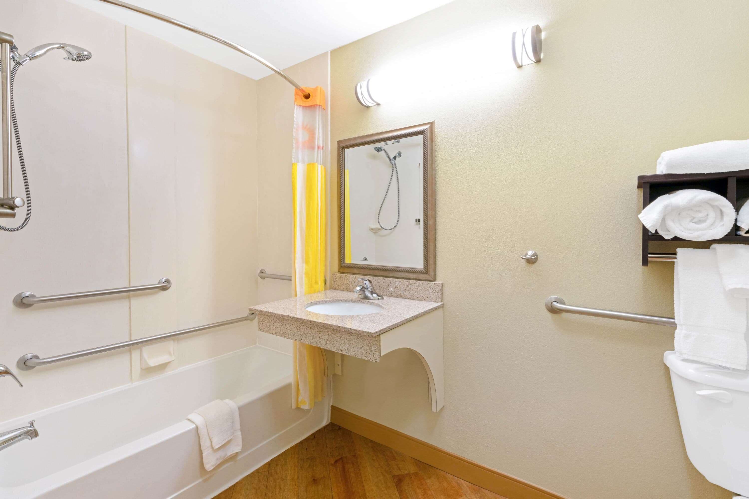 combined shower/bathtub, free toiletries, hair dryer, towels