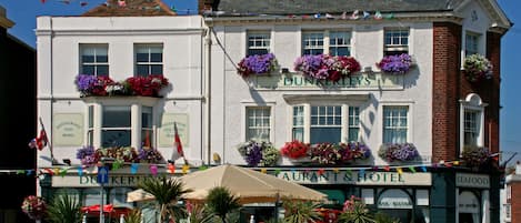 A traditional building with a sign 'DUNNERLEY'S' indicating a restaurant and hotel.
