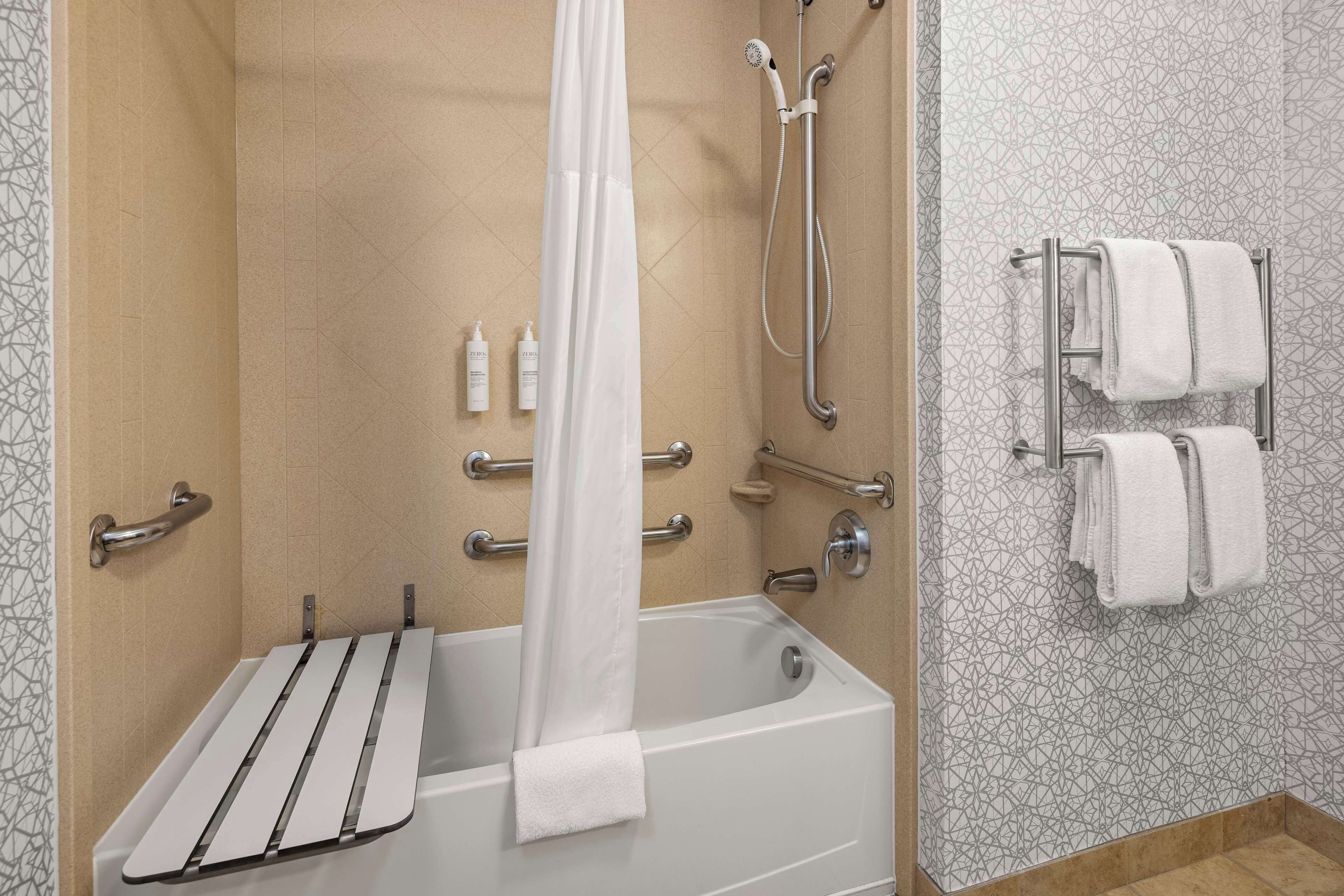combined shower/bathtub, free toiletries, hair dryer, towels