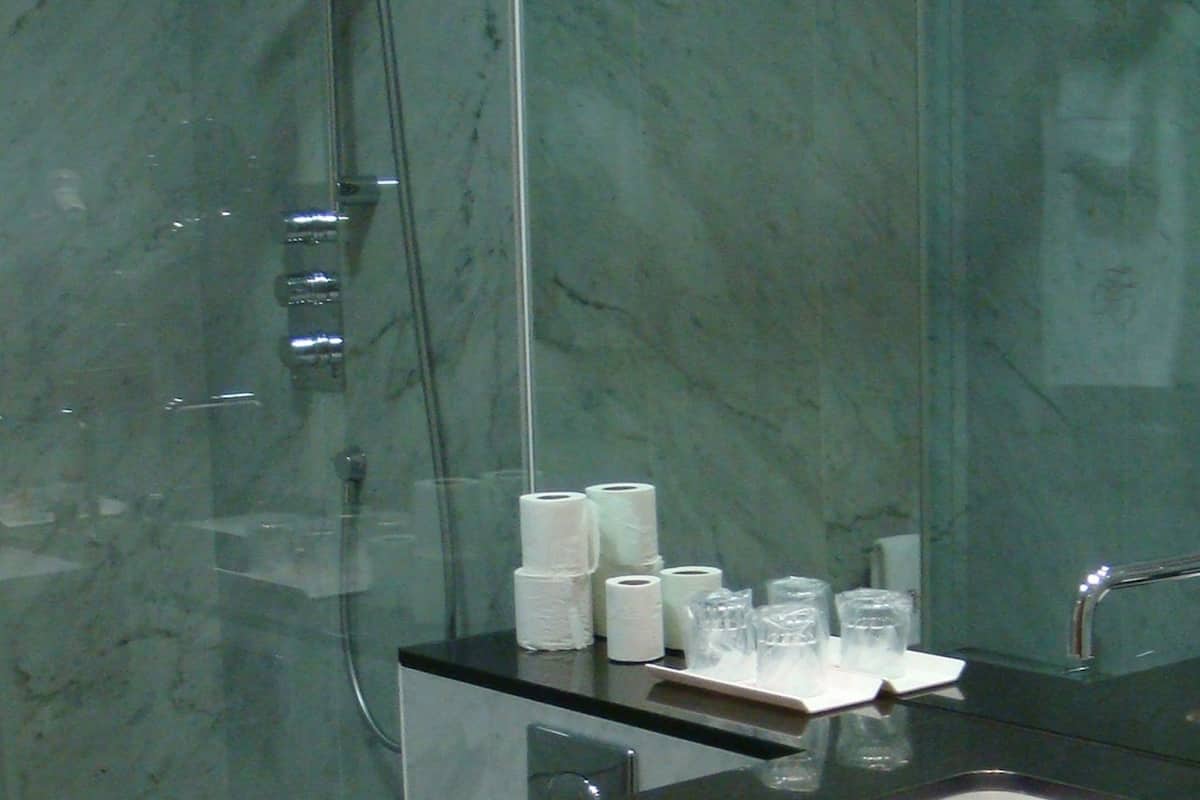 superior double room | bathroom | shower, free toiletries, hair dryer, towels