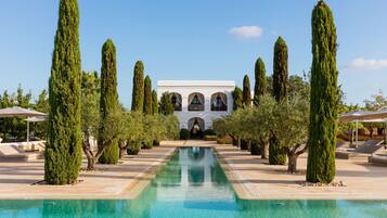 Outdoor pool, pool umbrellas, pool loungers