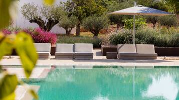 Outdoor pool, pool umbrellas, pool loungers