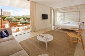 Suite Premier | Roba de llit d'alta qualitat, minibar i caixa forta a l'habitació 