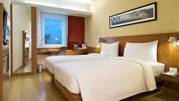 Premium bedding, down duvets, minibar, in-room safe