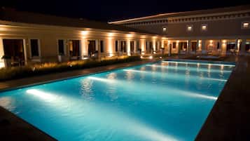 Outdoor pool, pool umbrellas, sun loungers