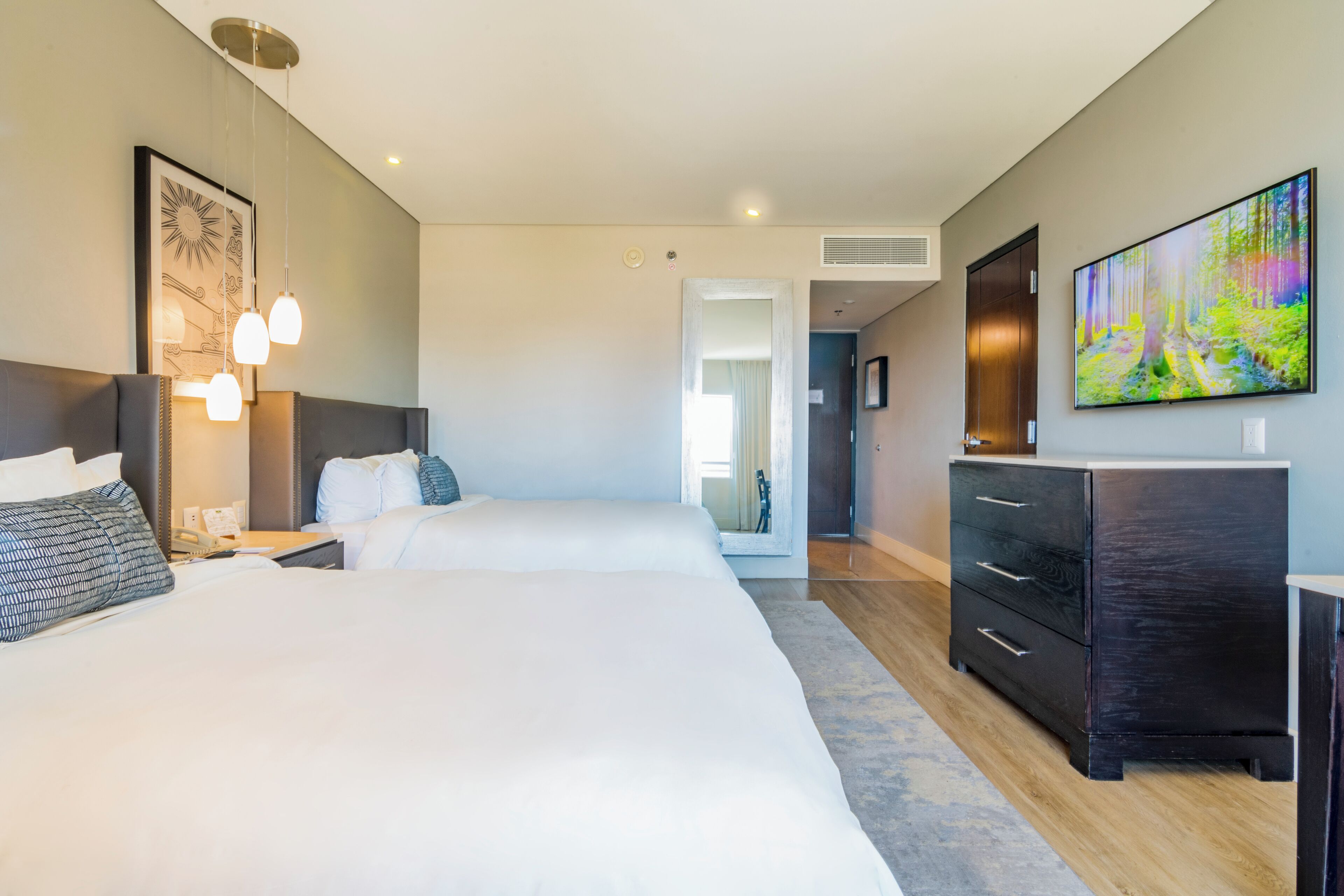 deluxe room, 2 double beds | in-room safe, desk, iron/ironing board, free wifi