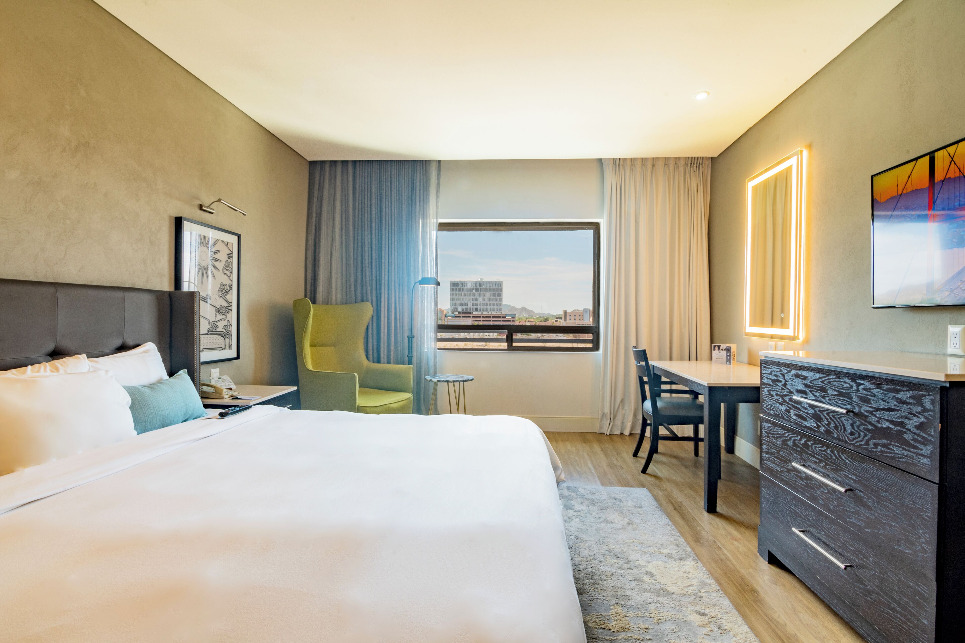 deluxe room, 1 king bed | in-room safe, desk, iron/ironing board, free wifi