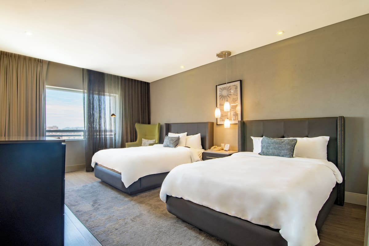 Deluxe Room, 2 Double Beds | In-room safe, desk, iron/ironing board, free WiFi