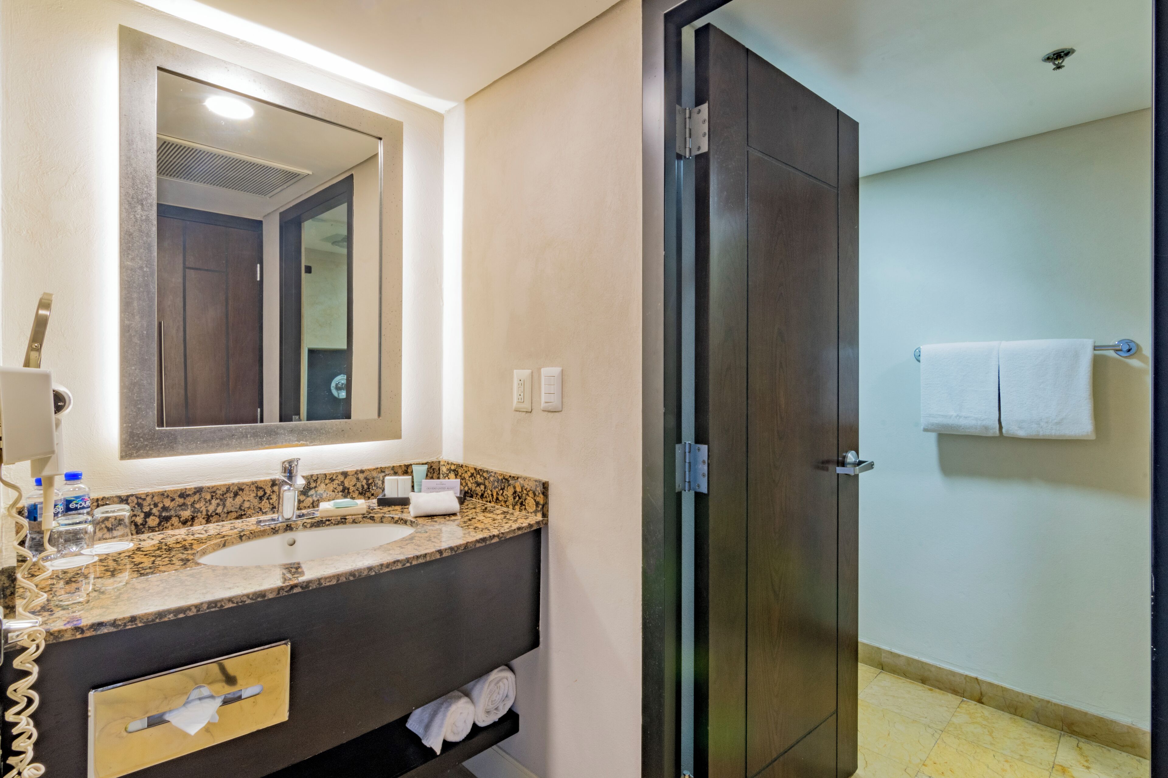 deluxe room, 1 king bed | bathroom | shower, hair dryer, towels