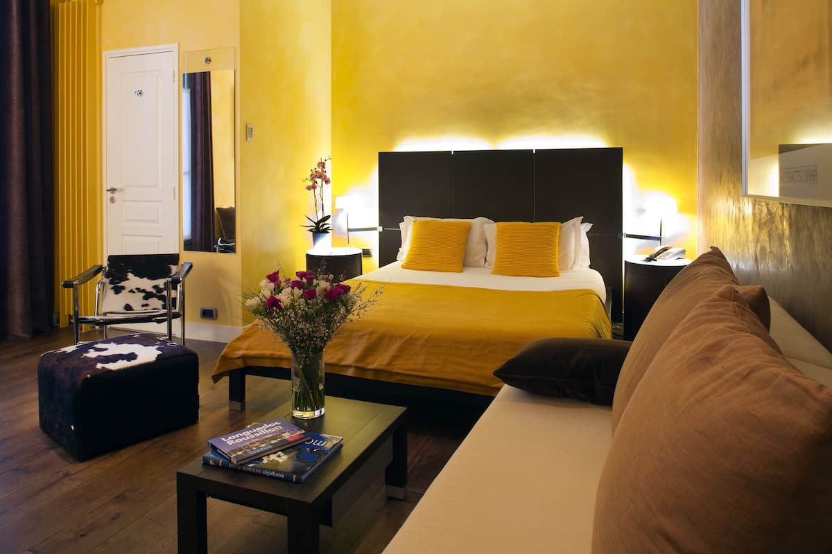 Luxe beddengoed, een minibar, een kluis op de kamer