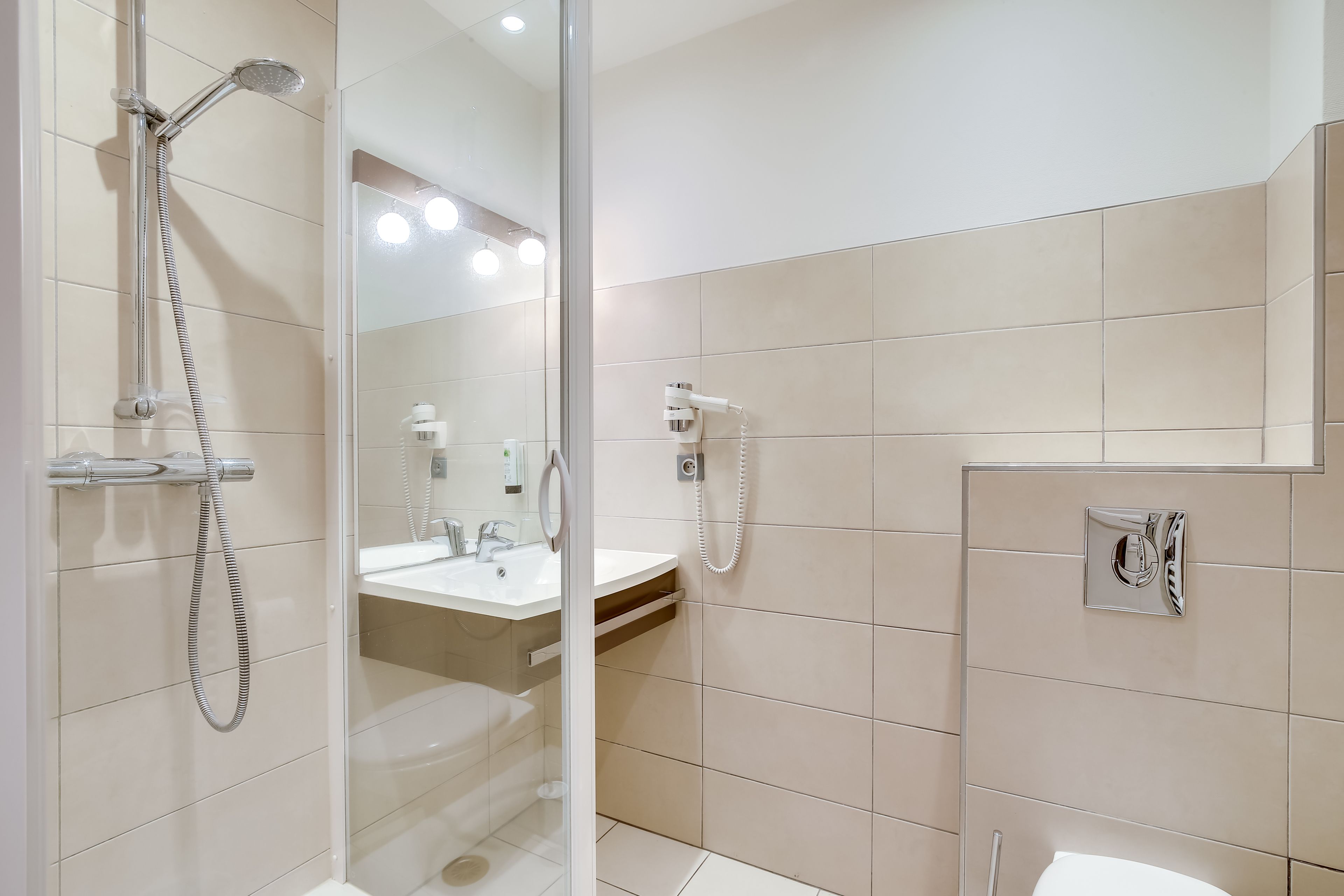 premium double room | bathroom | shower, hair dryer, towels