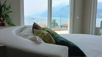 Junior Suite Deluxe with balcony and lake view | In-room safe, desk, iron/ironing board, free WiFi