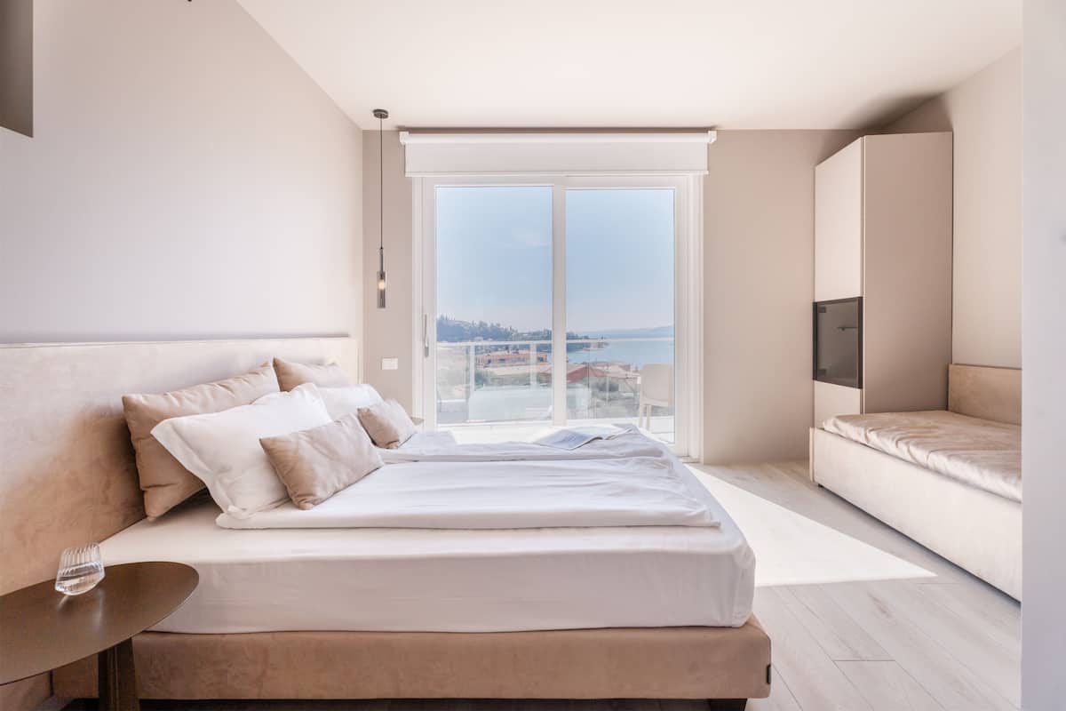 Junior Room, Balcony, Partial Lake View | In-room safe, desk, iron/ironing board, free WiFi