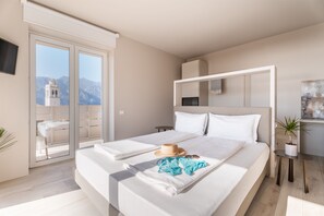 Deluxe Room, Balcony, Lake View | In-room safe, desk, iron/ironing board, free WiFi