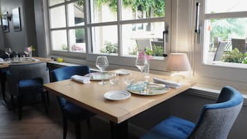 Lunch, dinner served; French cuisine, garden views