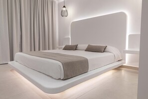 In-room safe, desk, laptop workspace, blackout drapes - Aeolos Resort Mykonos (Mykonos)