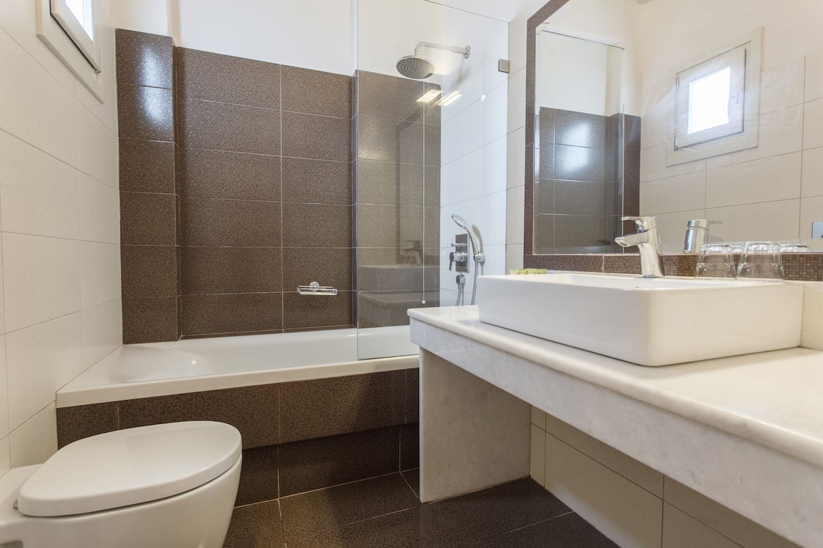 sunset wing double room sea view | bathroom | shower, free toiletries, hair dryer, slippers