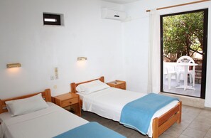 Family Apartment, 1 Bedroom (4 Adults) | 1 bedroom, in-room safe, iron/ironing board, free cribs/infant beds