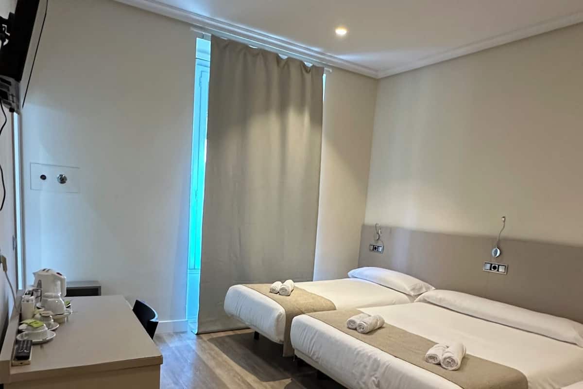 Down comforters, in-room safe, WiFi (free), bed sheets