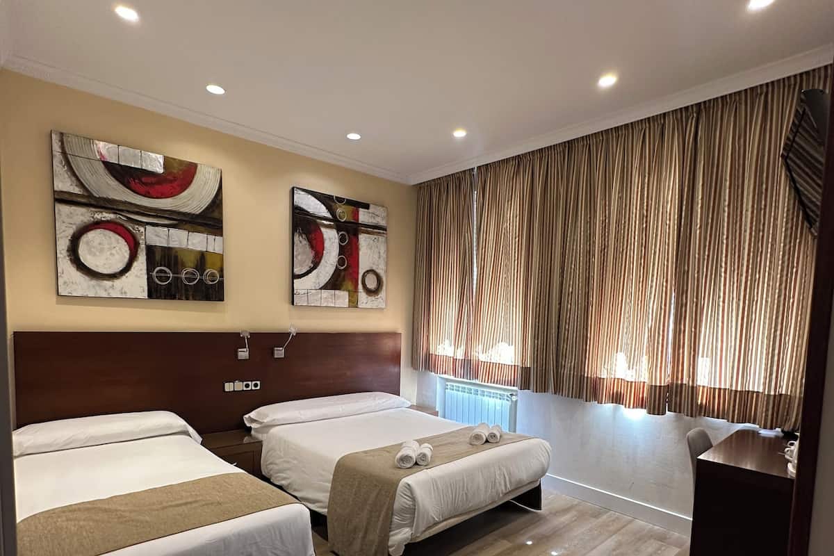 Down comforters, in-room safe, WiFi (free), bed sheets