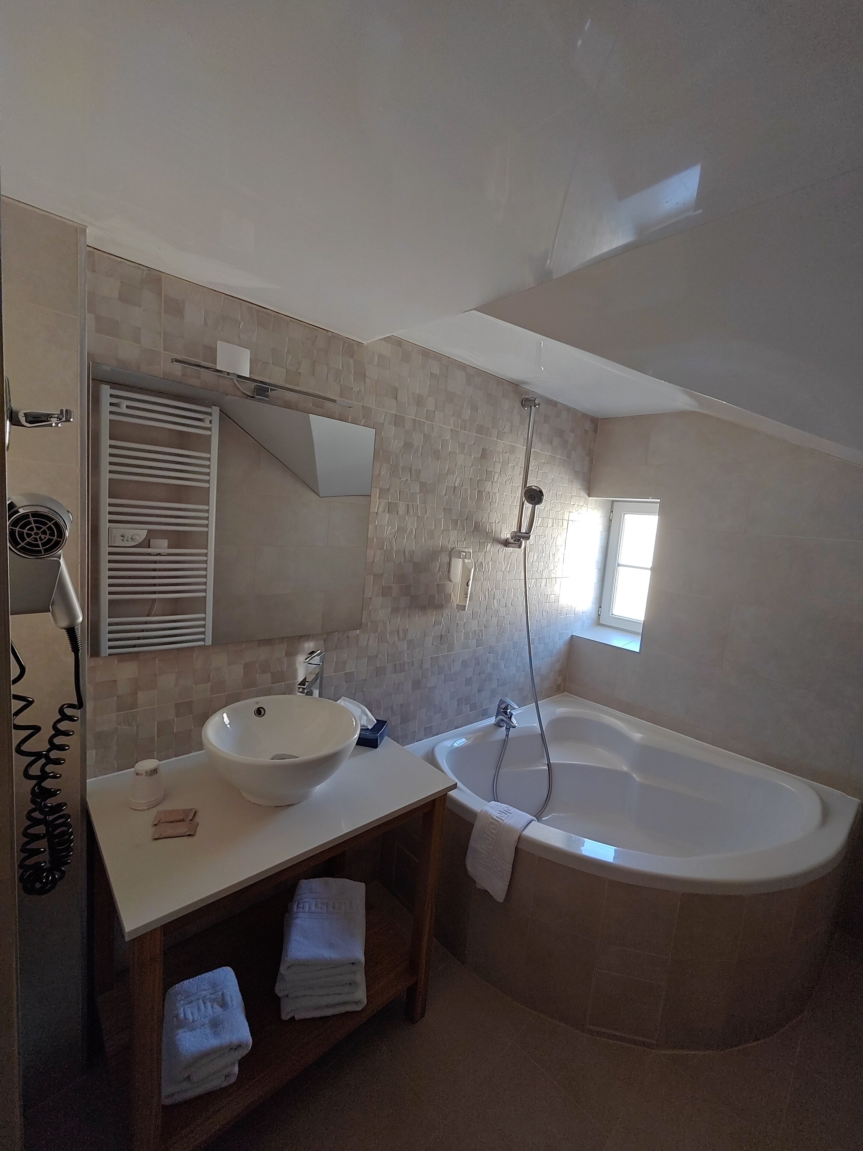 comfort triple room | bathroom | rainfall showerhead, free toiletries, hair dryer, towels