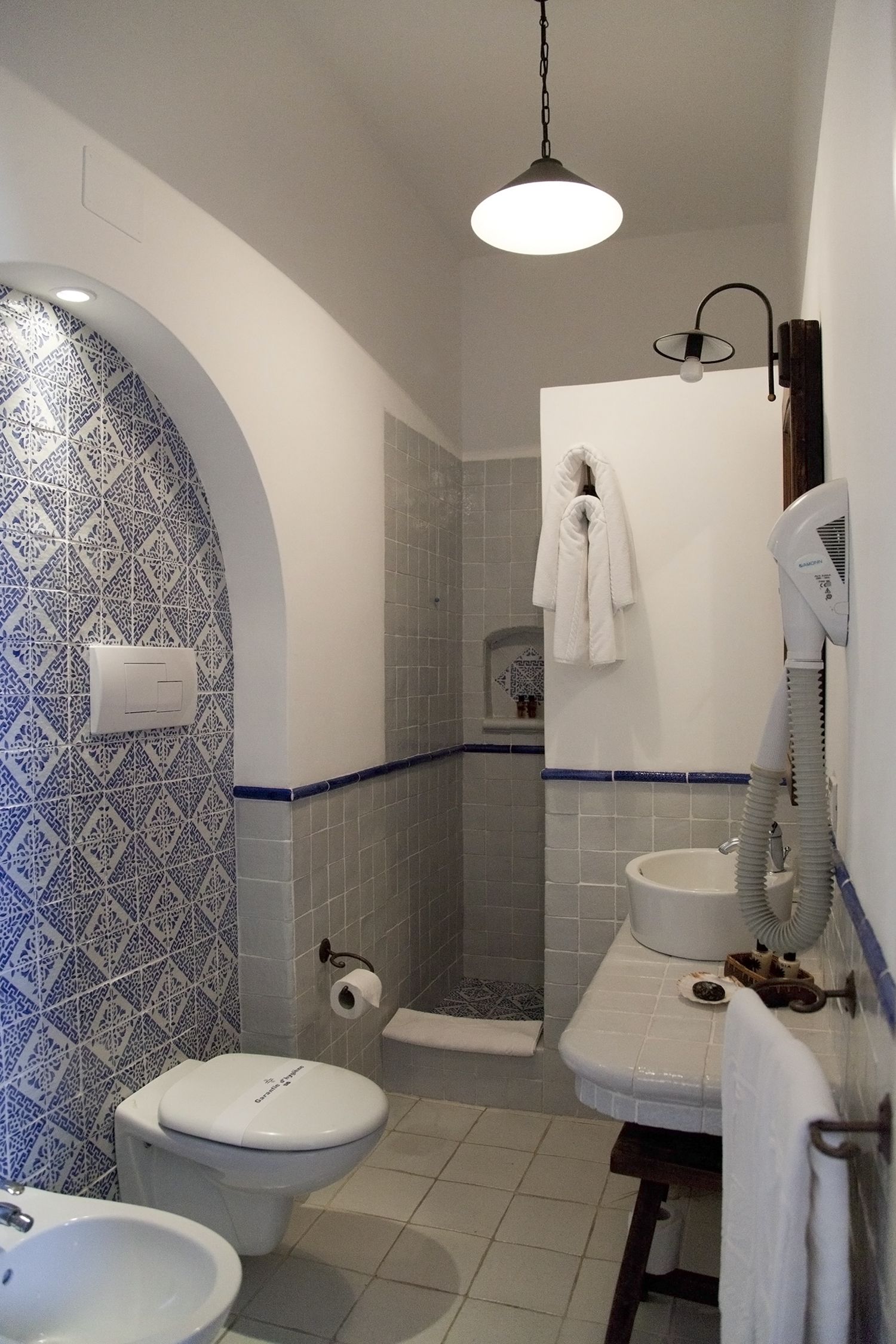 superior single room | bathroom | shower, free toiletries, hair dryer, bathrobes