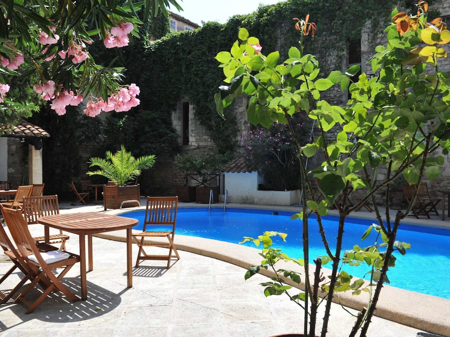 Seasonal outdoor pool, open 8:30 AM to 8:30 PM, pool loungers