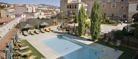 Outdoor pool, pool umbrellas, pool loungers