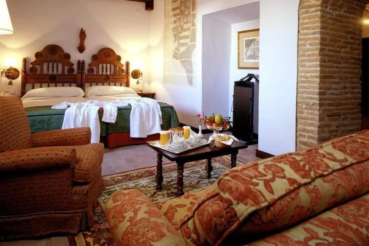 Roba de llit d'alta qualitat, minibar i caixa forta a l'habitació