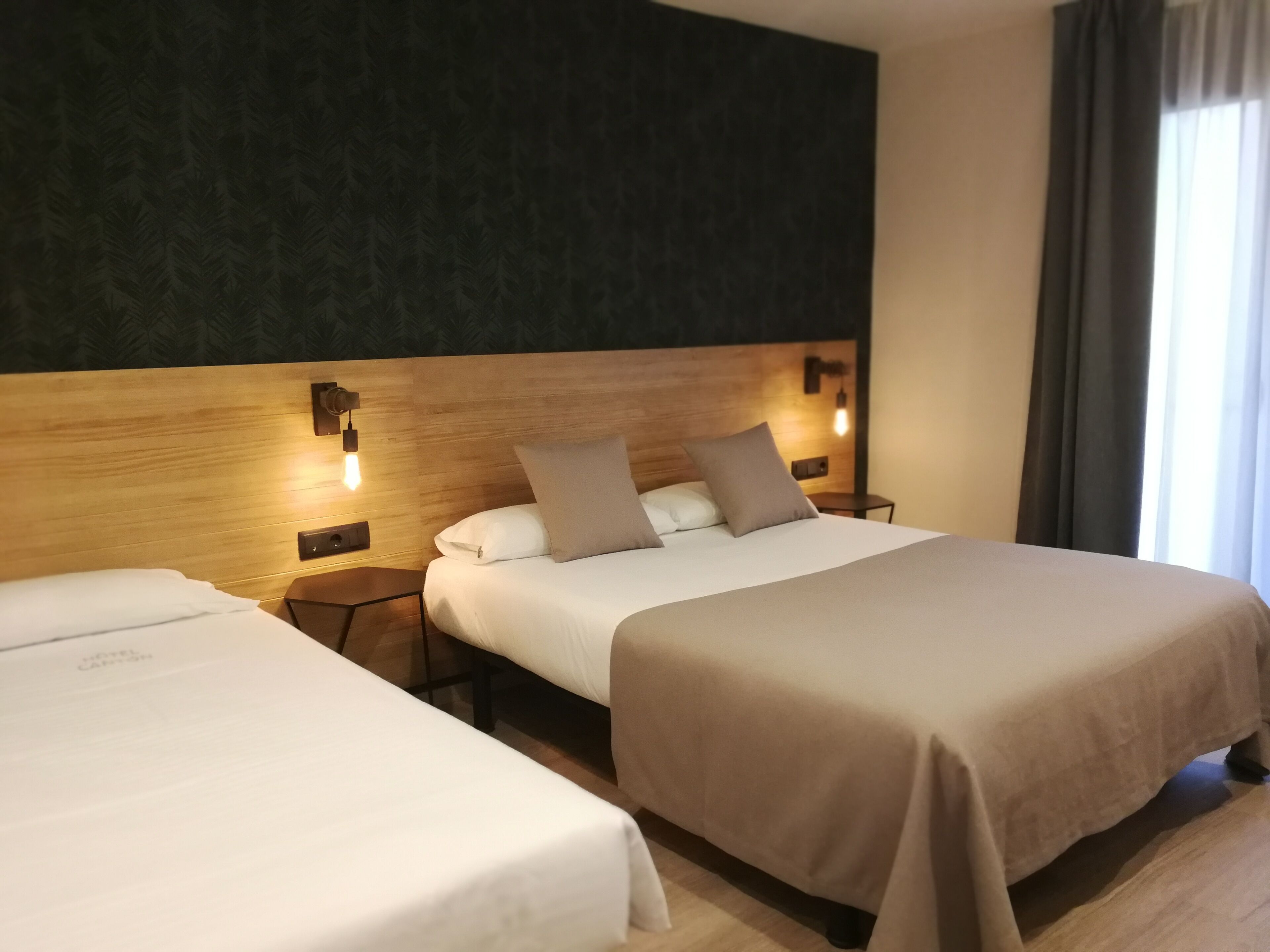 superior family triple room, multiple beds | minibar, in-room safe, blackout curtains, soundproofing