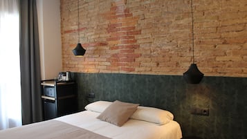 Minibar, coffres-forts dans les chambres, rideaux occultants