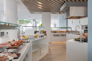 Daily buffet breakfast (EUR 18 per person)