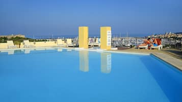 2 outdoor pools, pool umbrellas, sun loungers