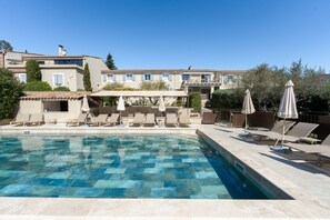 Seasonal outdoor pool, pool umbrellas, pool loungers