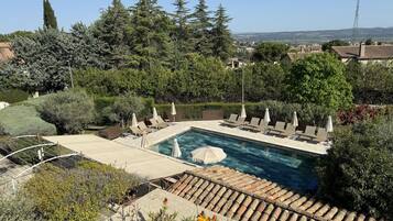 Seasonal outdoor pool, pool umbrellas, sun loungers