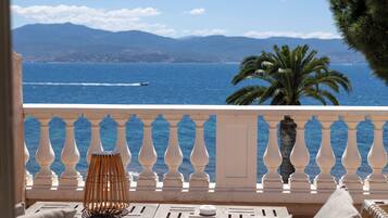 Deluxe Suite, Sea View | Premium bedding, minibar, in-room safe, individually decorated