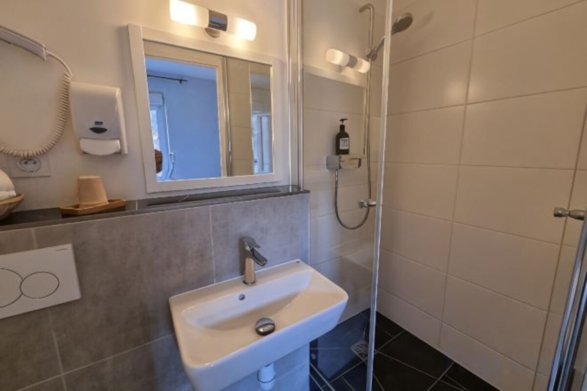 Bathroom | Eco-friendly toiletries, hair dryer, towels, soap